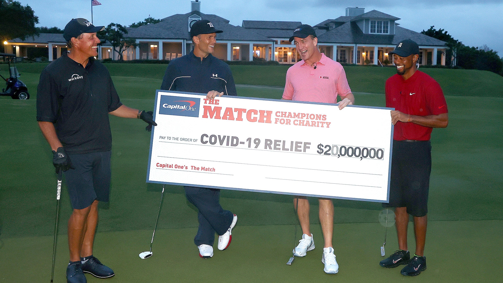 Tiger Woods, Peyton Manning hang on to win Champions for Charity match