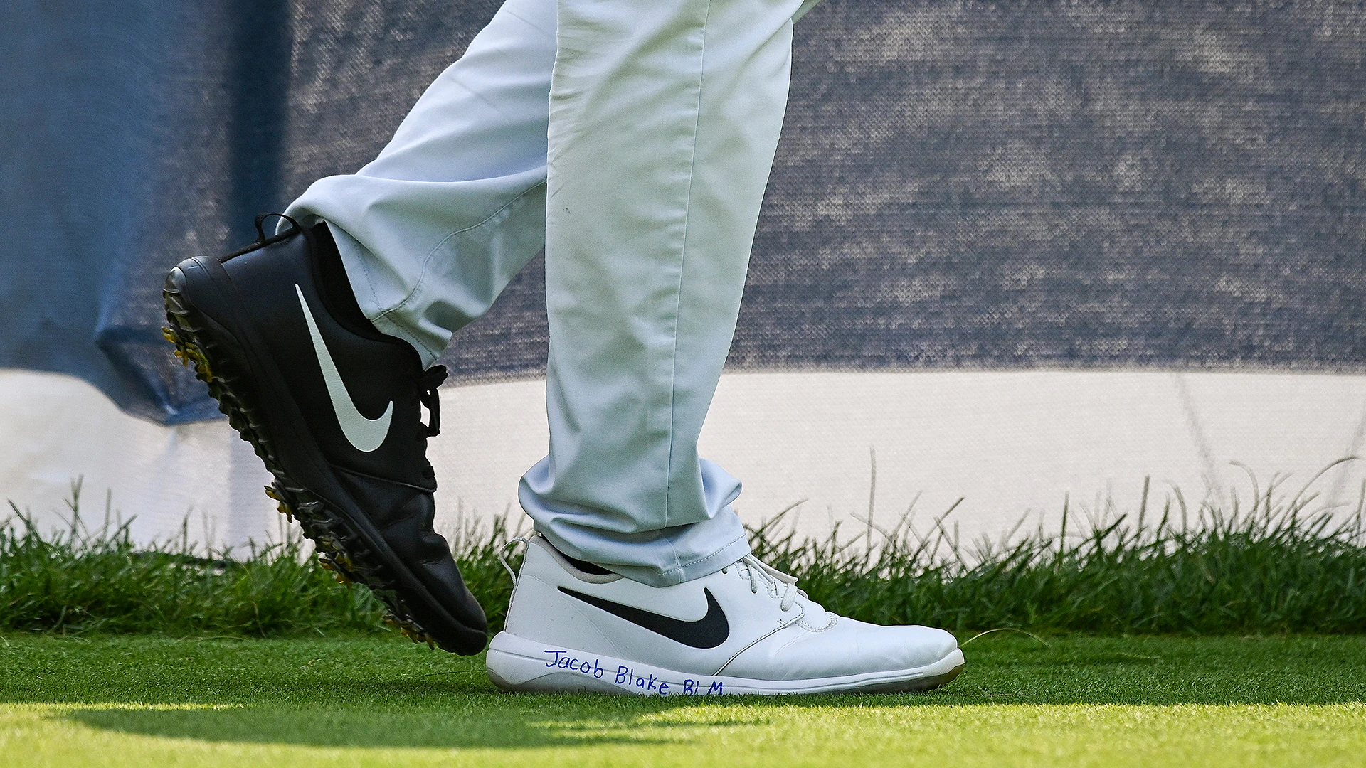 Cameron Champ making racial injustice statement with black-and-white shoes