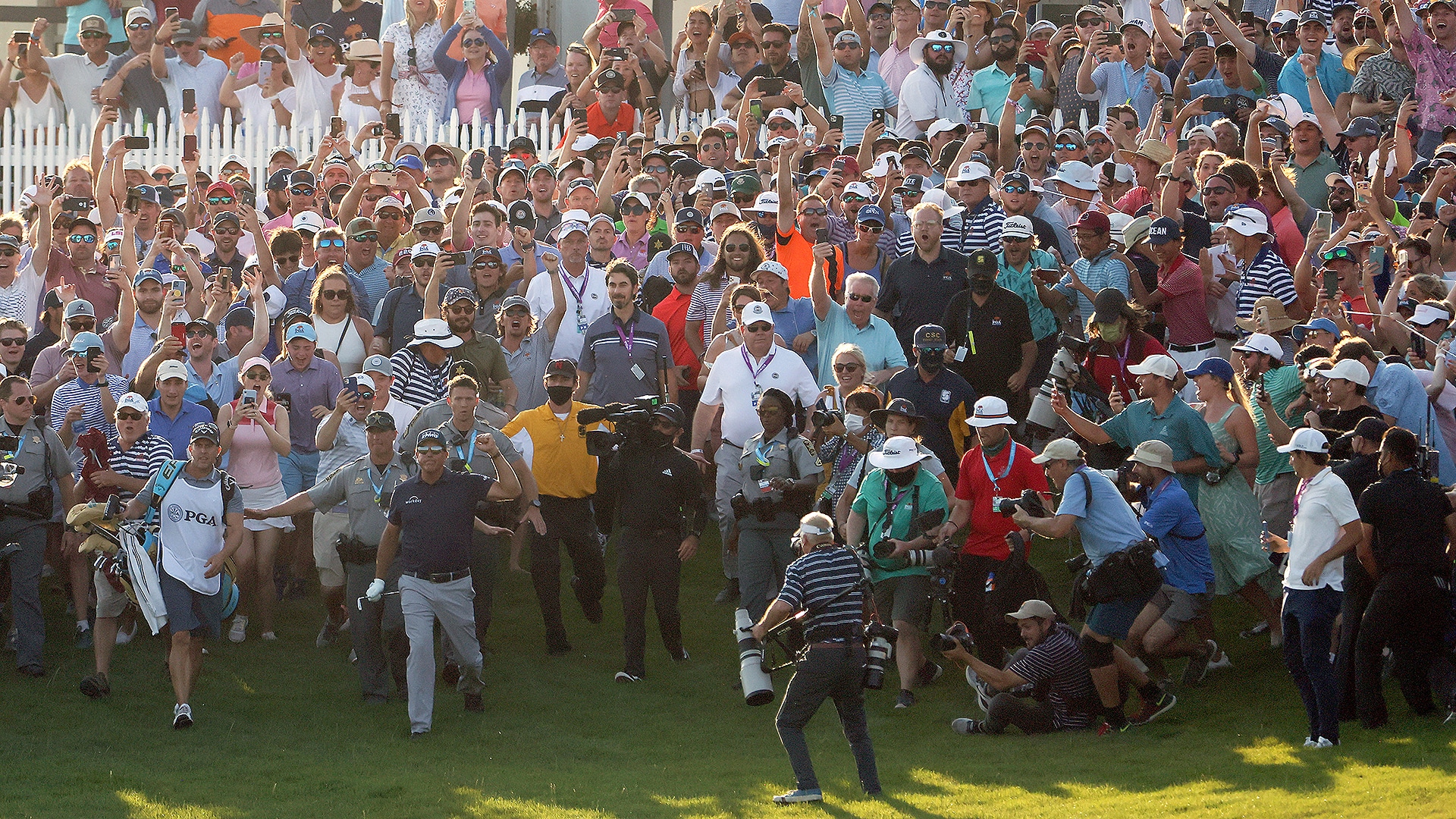 PGA CEO apologizes to Phil Mickelson, Brooks Koepka for fans rushing 18th hole