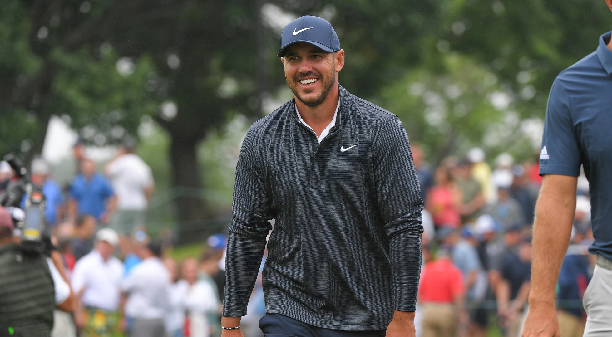 Watch: Brooks Koepka gets some straight cash from Justin Thomas