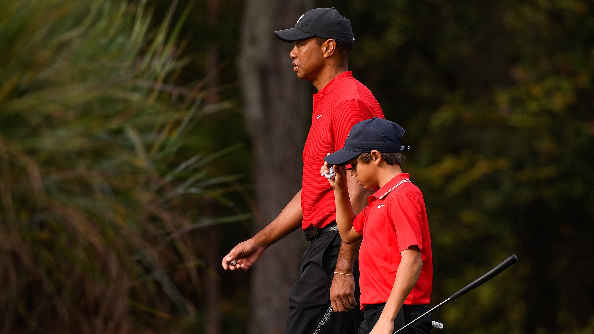 Watch: Tiger Woods captivated by video of he and son Charlie’s similarities