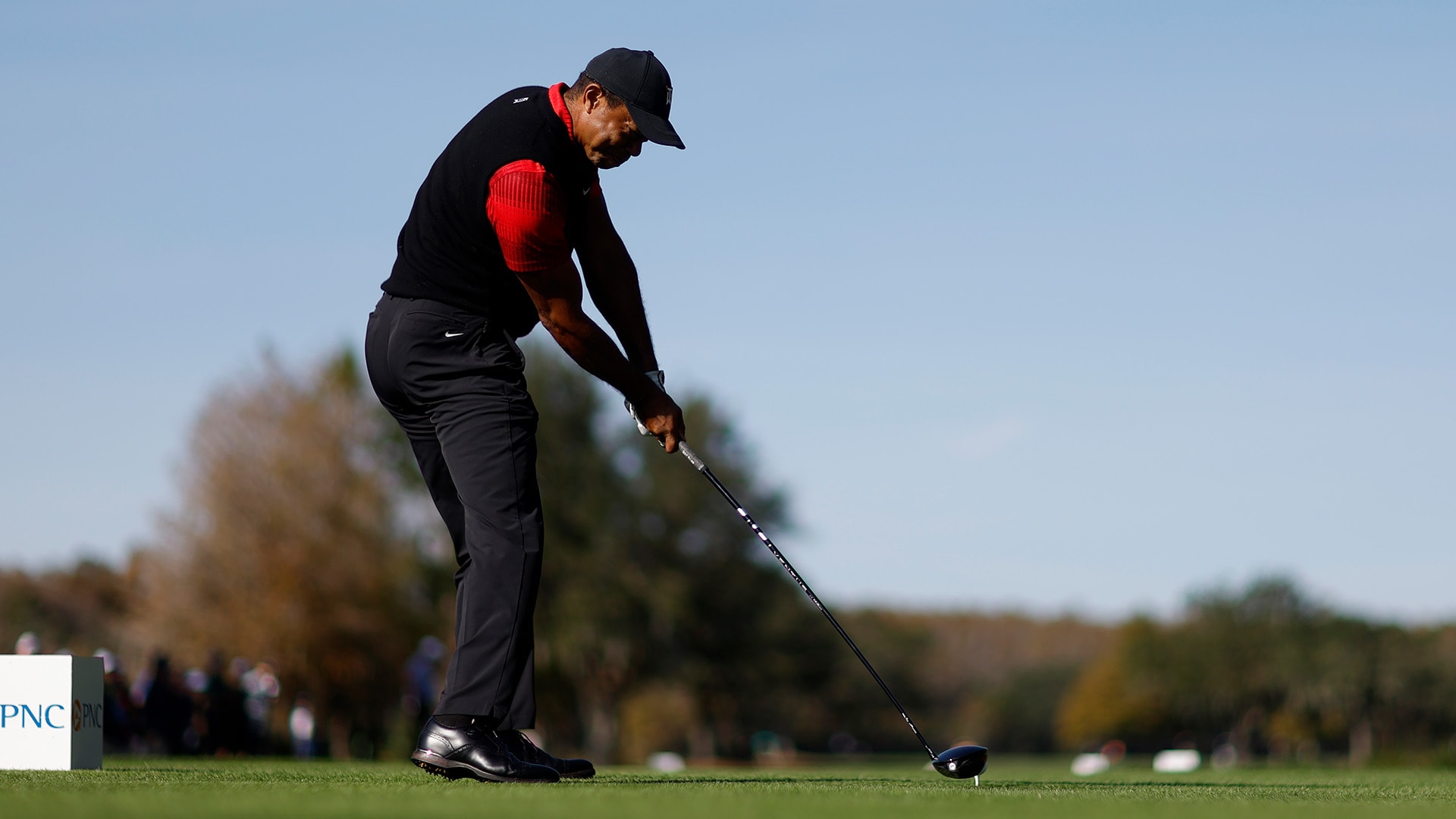 Despite injuries, Tiger Woods flashes power at PNC Championship