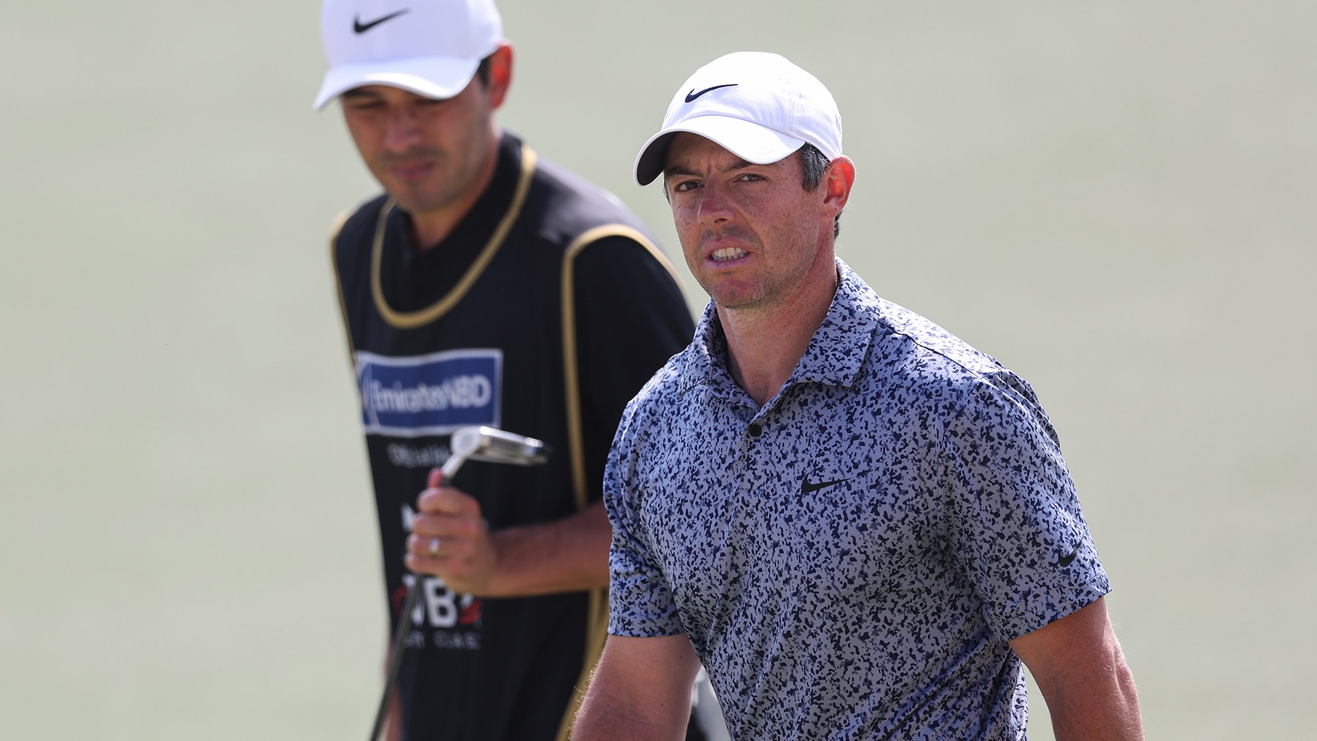 Rory McIlroy birdies final hole to win in Dubai and avoid playoff with Patrick Reed