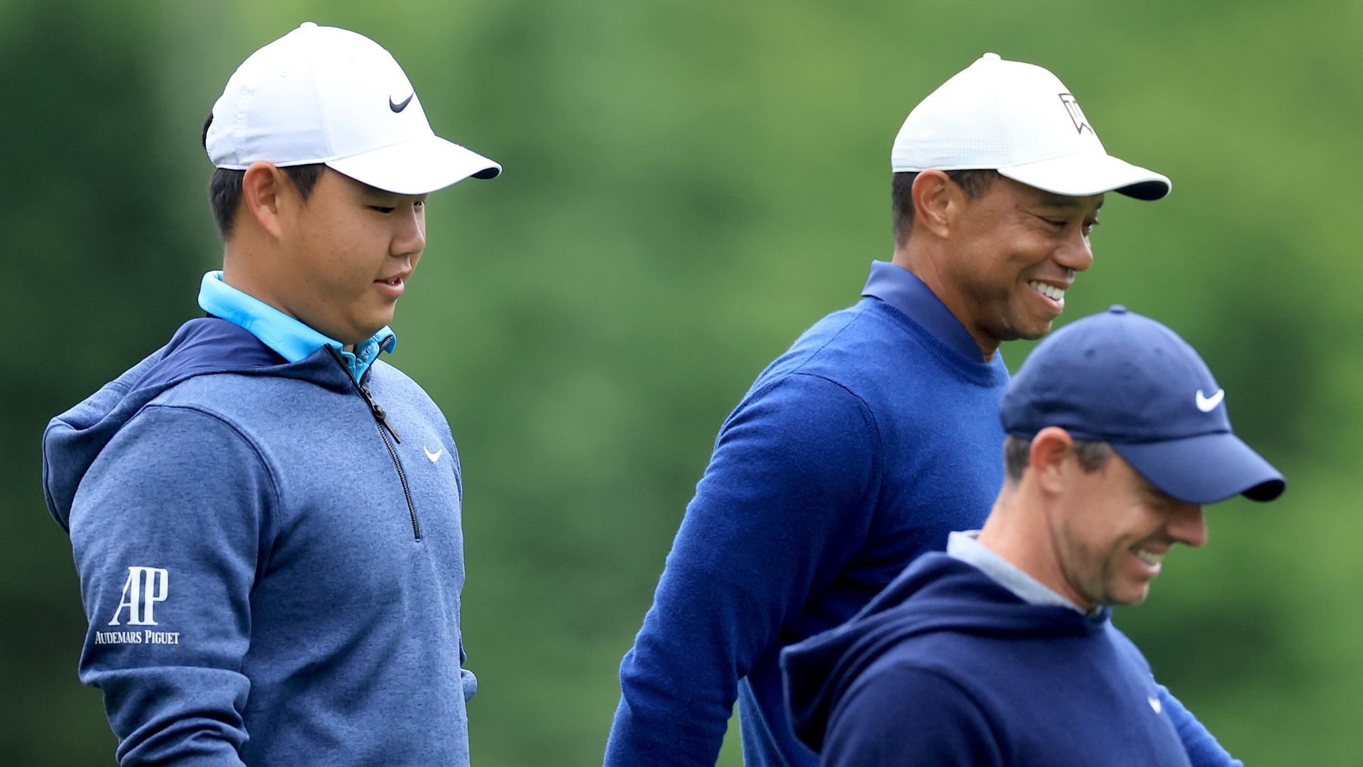 Tom Kim picks Tiger Woods’ brain, nearly picks off fans with errant skip