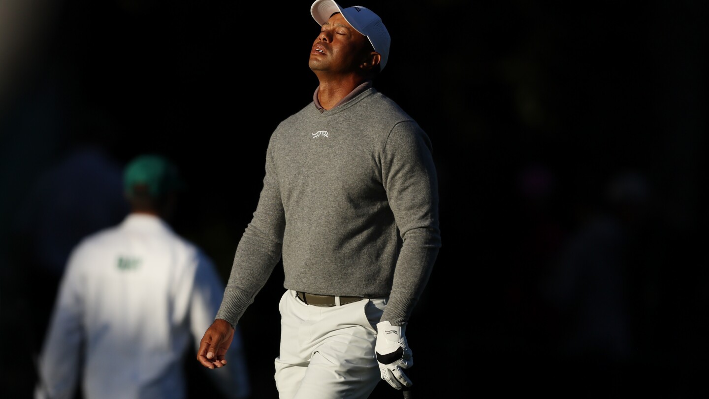 Tiger Woods backs up on chilly Masters morning, has quick turnaround