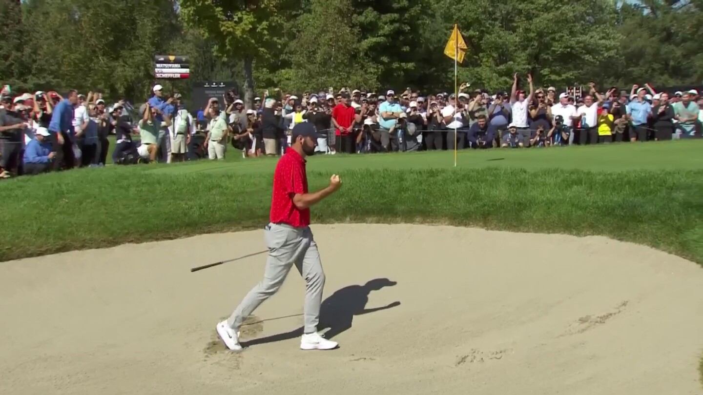 Scottie Scheffler slam dunks it from the bunker at Presidents Cup