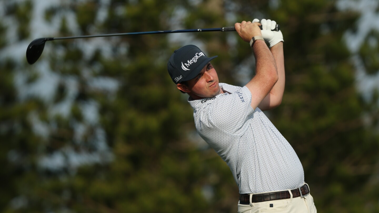 J.T. Poston’s 62 leads way at low-scoring American Express